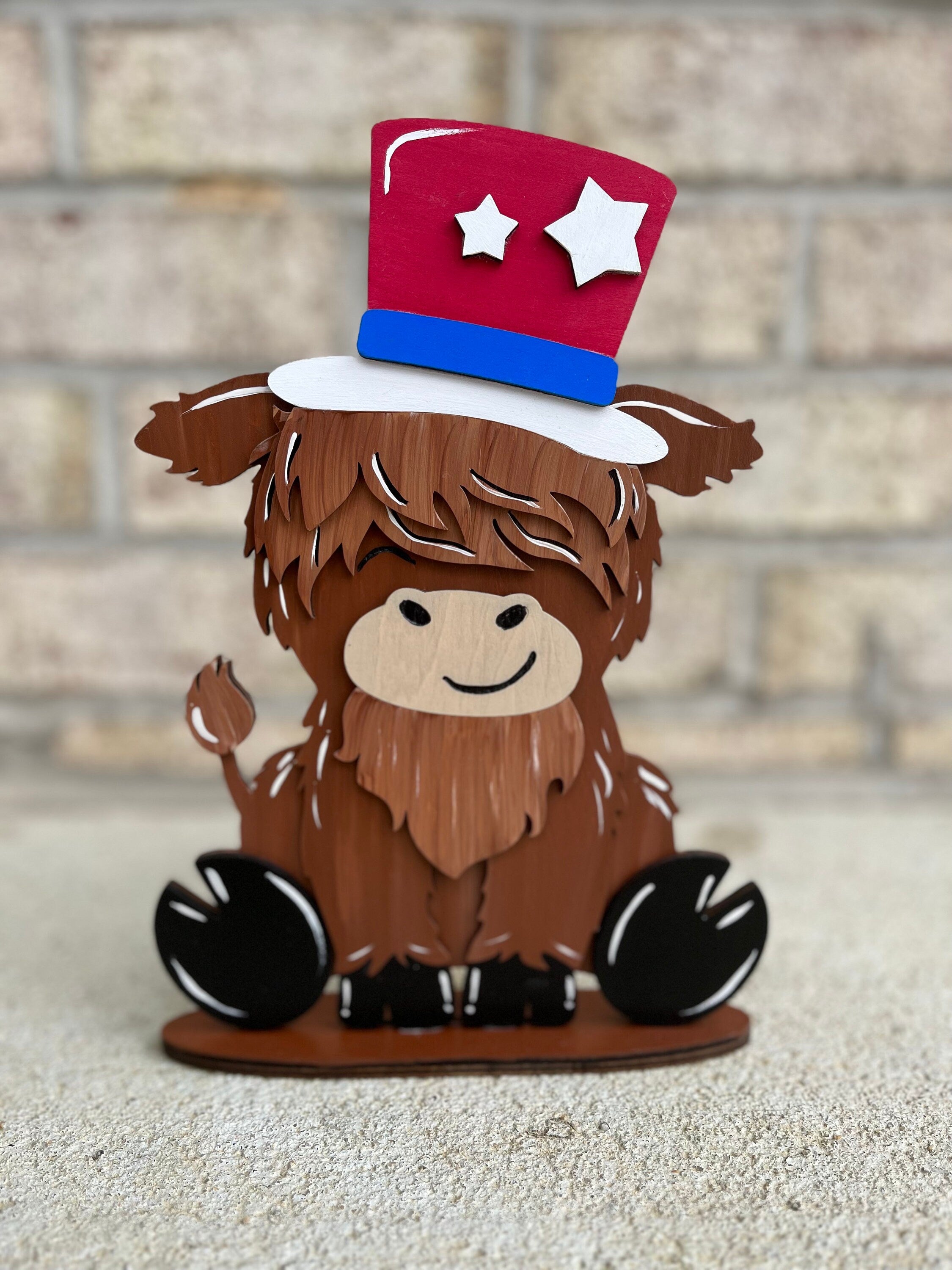 Cute Highland Cow Desk Buddy with Interchangeable Seasonal Hats