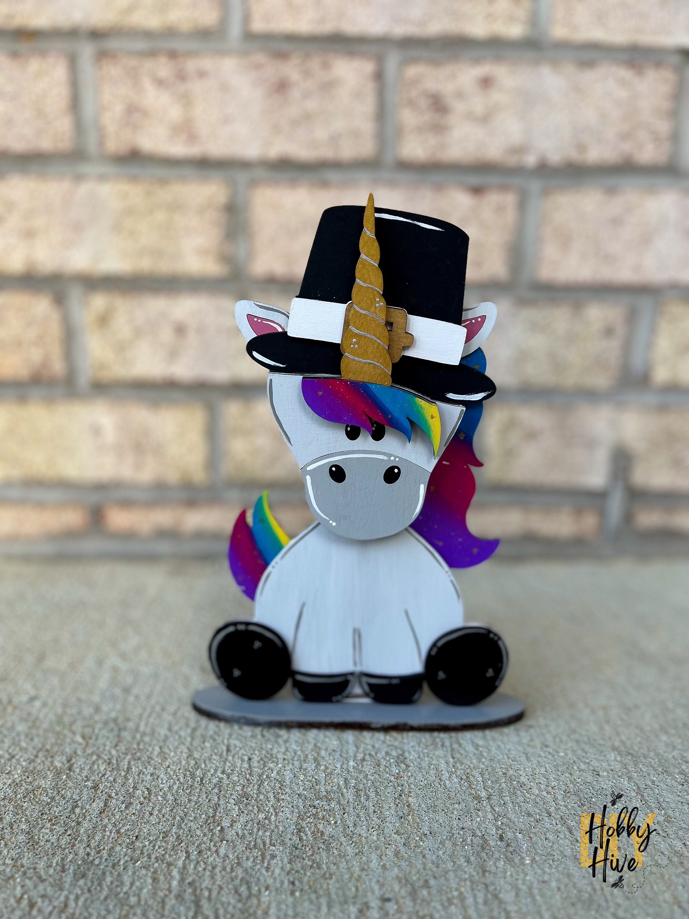 Magical Unicorn Desk Buddy with Interchangeable Hats for Decor and Gifting