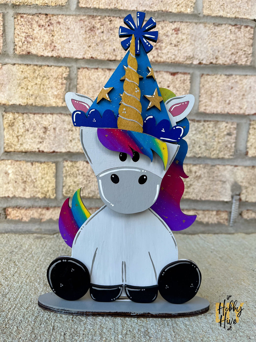 Magical Unicorn Desk Buddy with Interchangeable Hats for Decor and Gifting
