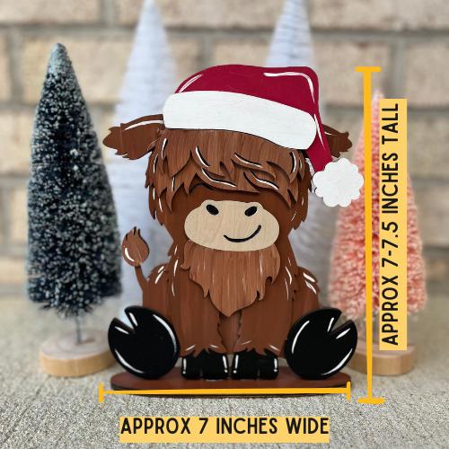 Cute Highland Cow Desk Buddy with Interchangeable Seasonal Hats