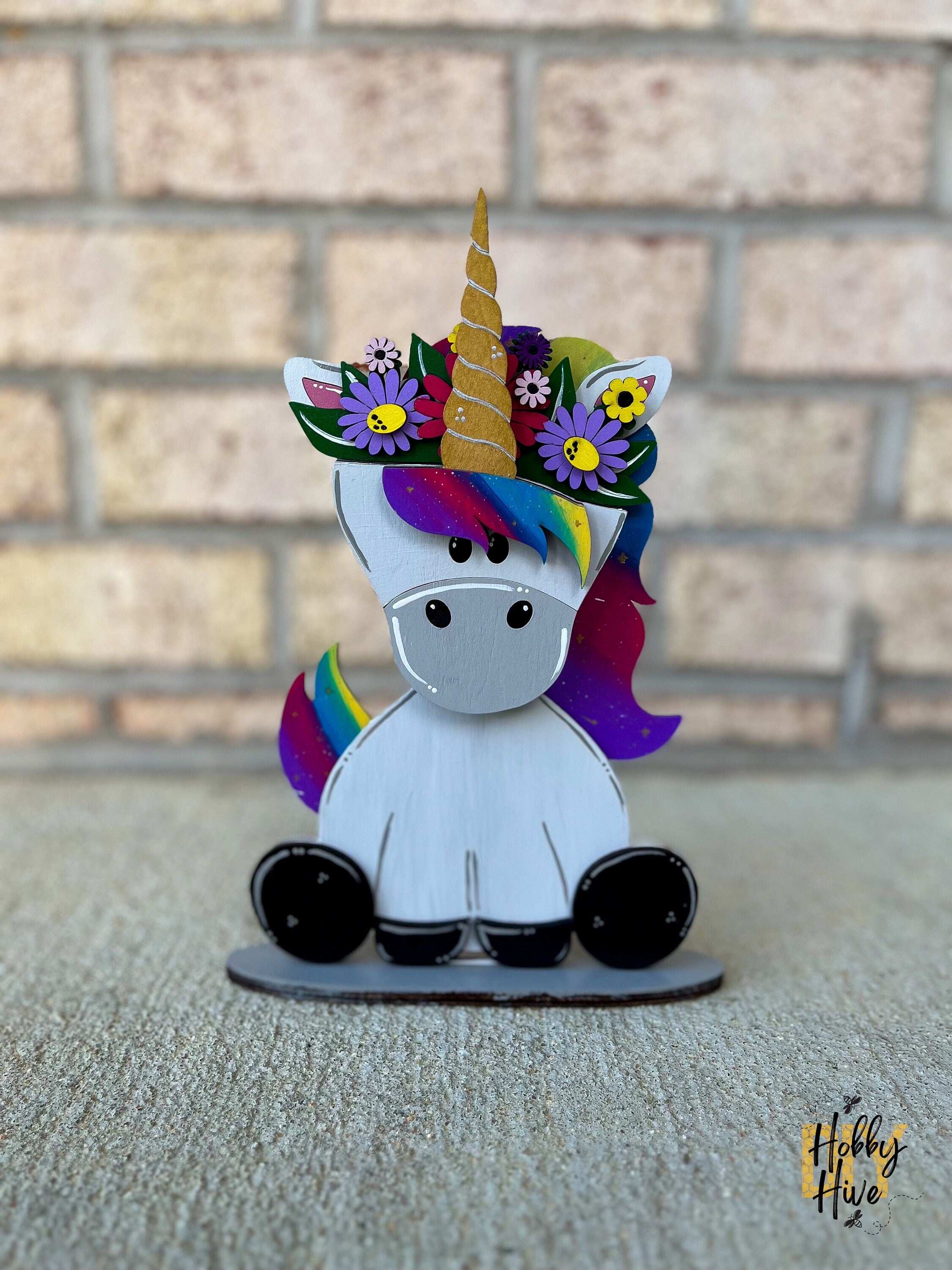 Magical Unicorn Desk Buddy with Interchangeable Hats for Decor and Gifting
