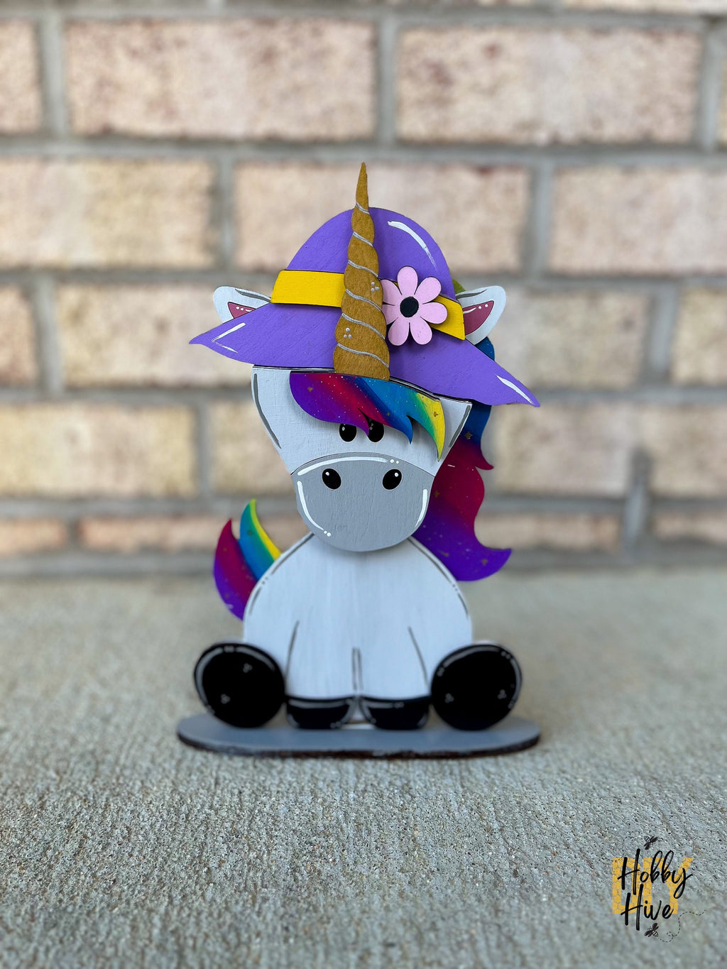 Magical Unicorn Desk Buddy with Interchangeable Hats for Decor and Gifting