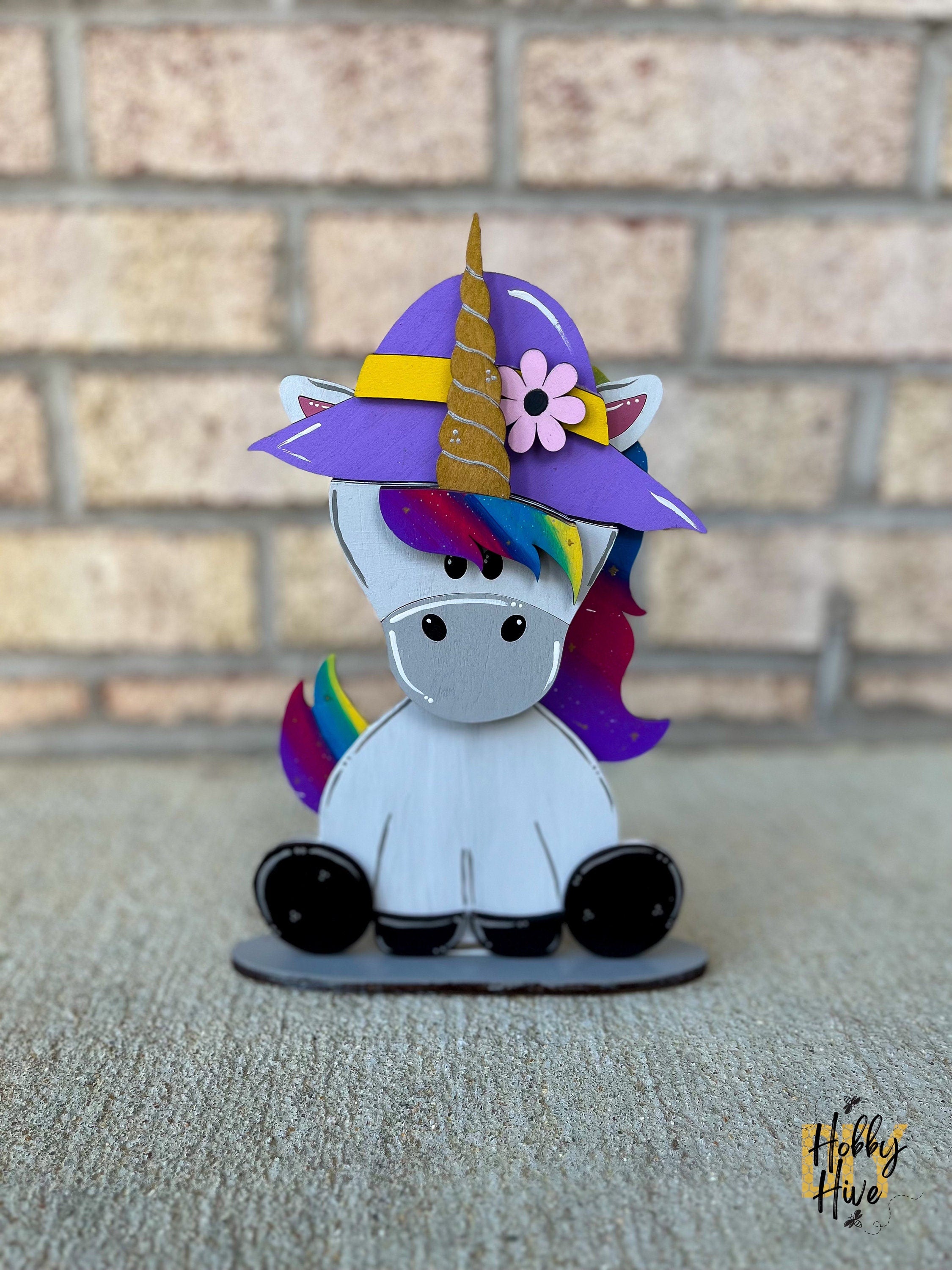 Magical Unicorn Desk Buddy with Interchangeable Hats for Decor and Gifting