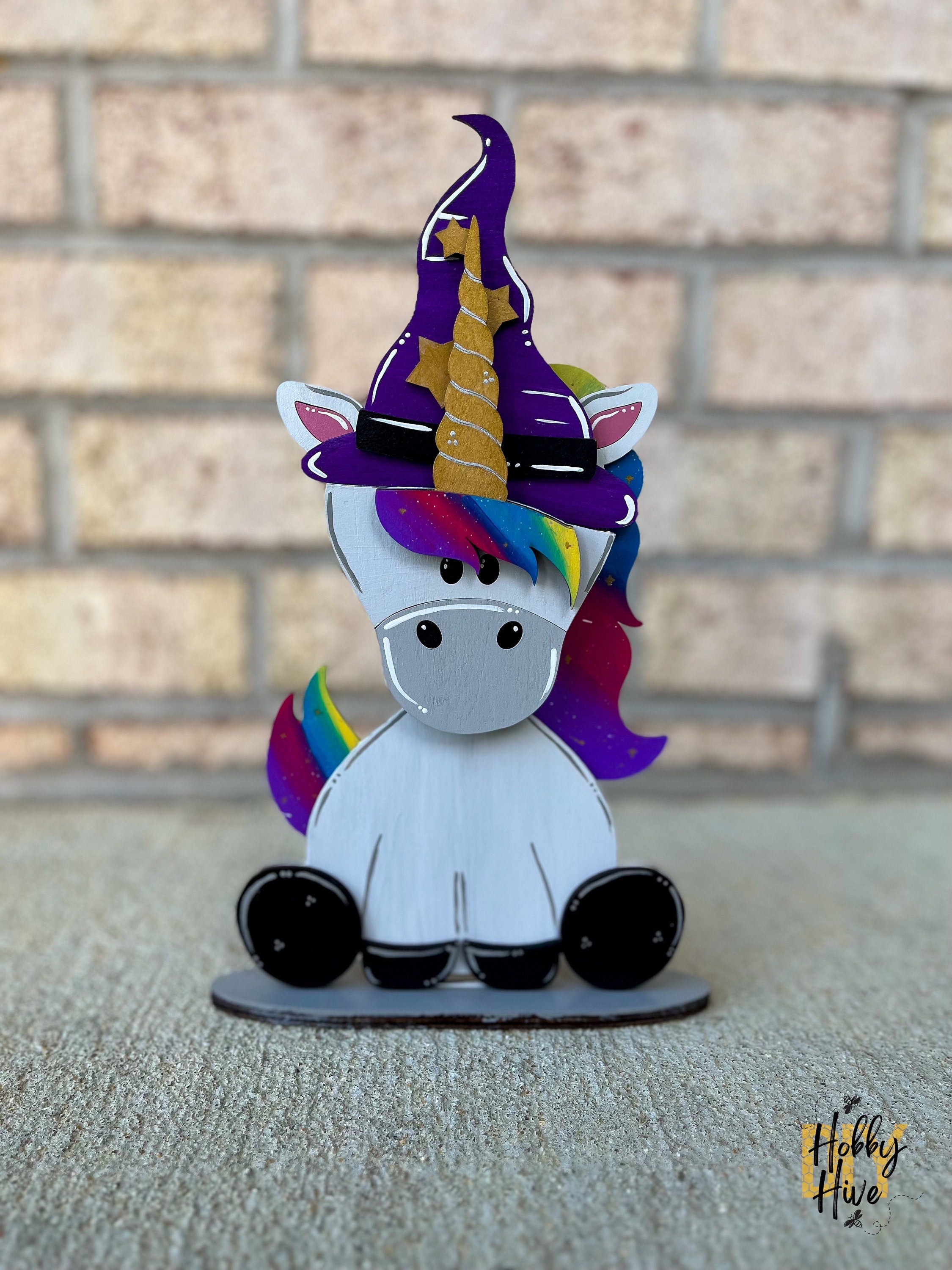 Magical Unicorn Desk Buddy with Interchangeable Hats for Decor and Gifting