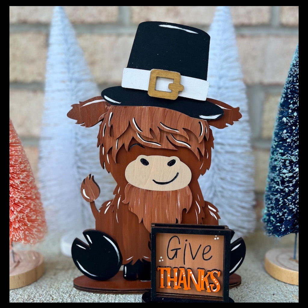Holiday Highland Cow Shelf Table Desk Sitter with Interchangeable Seasonal Hats